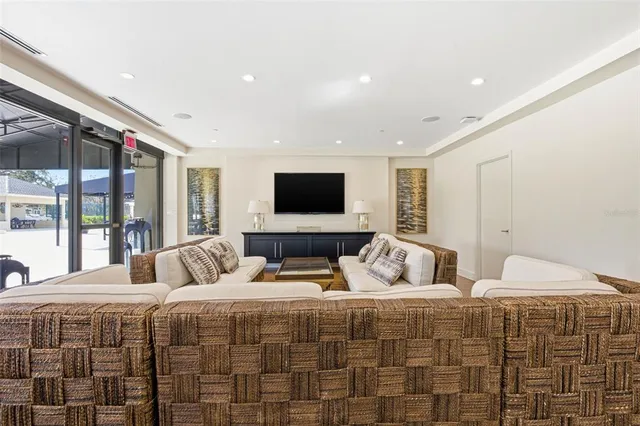 a view of a patio with dining table and chairs with plants