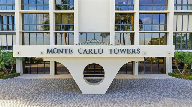 a living room with furniture wooden floor and a rug
