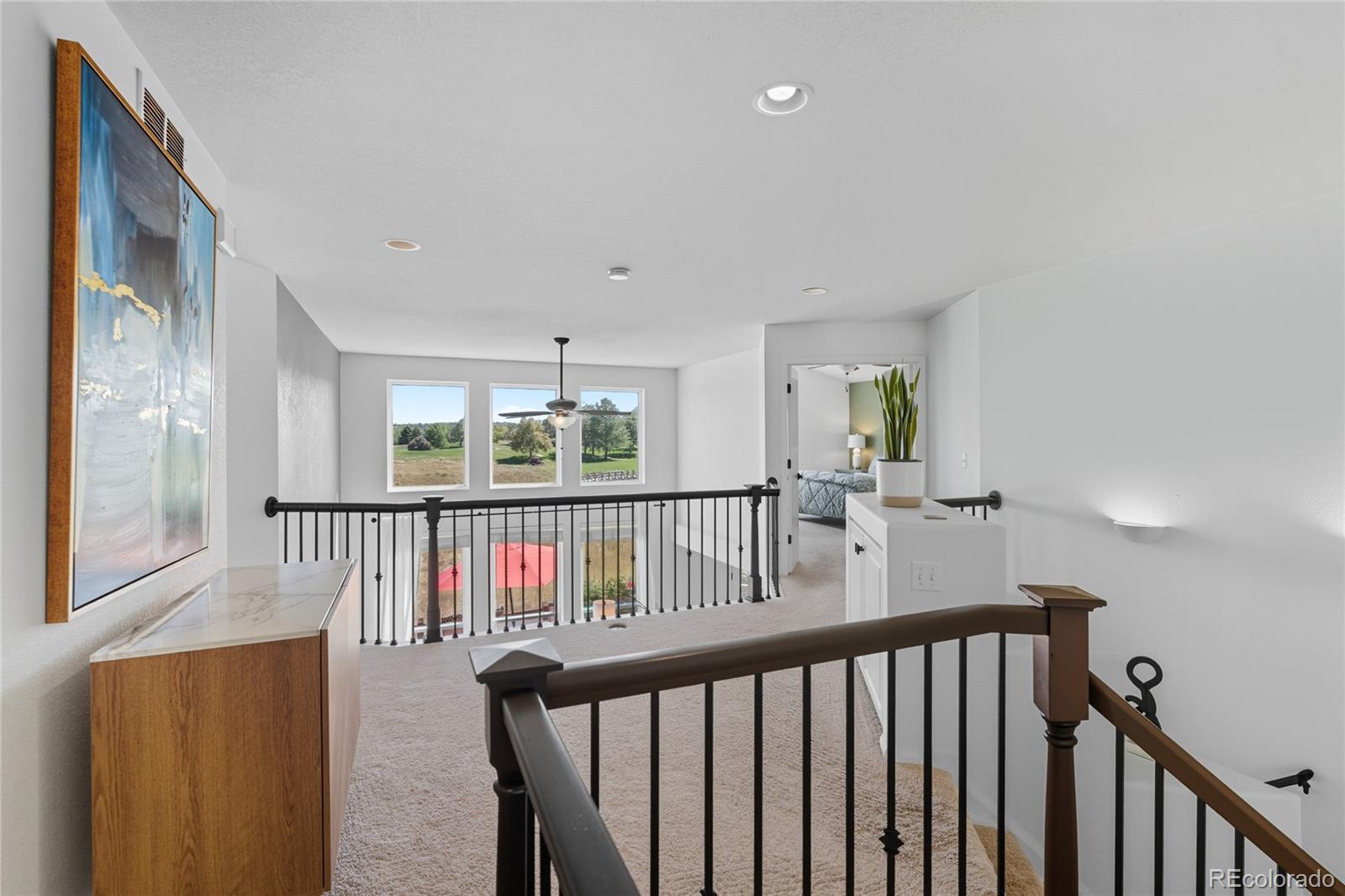 5126 Tuscany Court Highlands Ranch, CO 80130 - Photo 20 of 50 a view of hallway with furniture