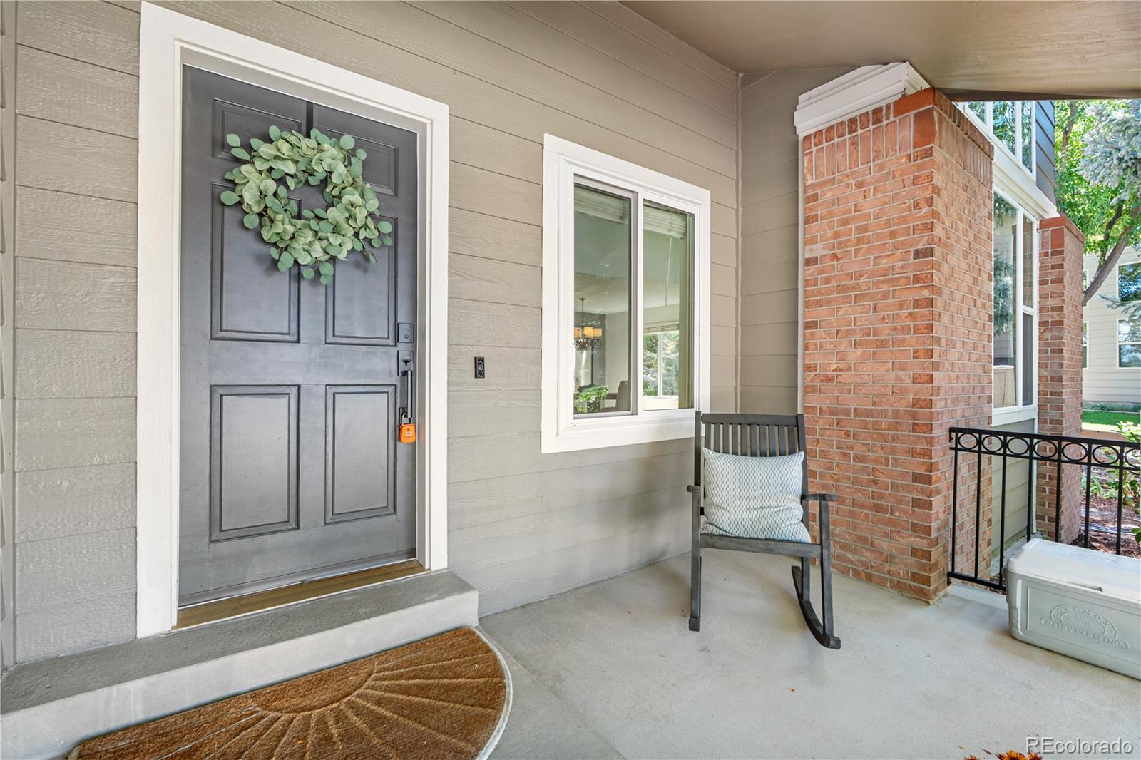 5126 Tuscany Court Highlands Ranch, CO 80130 - Photo 2 of 50 a view of livingroom with furniture and a window