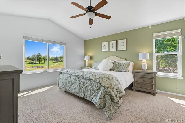 a bed room with a bed and a window