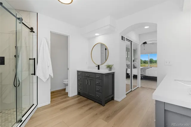 a view of a bathroom from the hallway