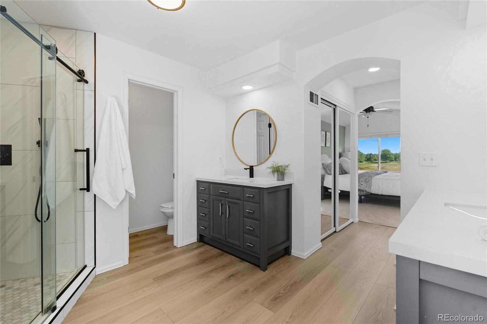 5126 Tuscany Court Highlands Ranch, CO 80130 - Photo 27 of 50 a view of a bathroom from the hallway