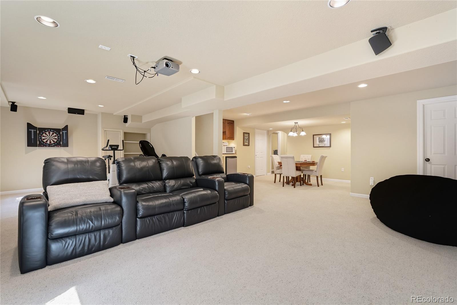 5126 Tuscany Court Highlands Ranch, CO 80130 - Photo 35 of 50 a living room with furniture and a large window