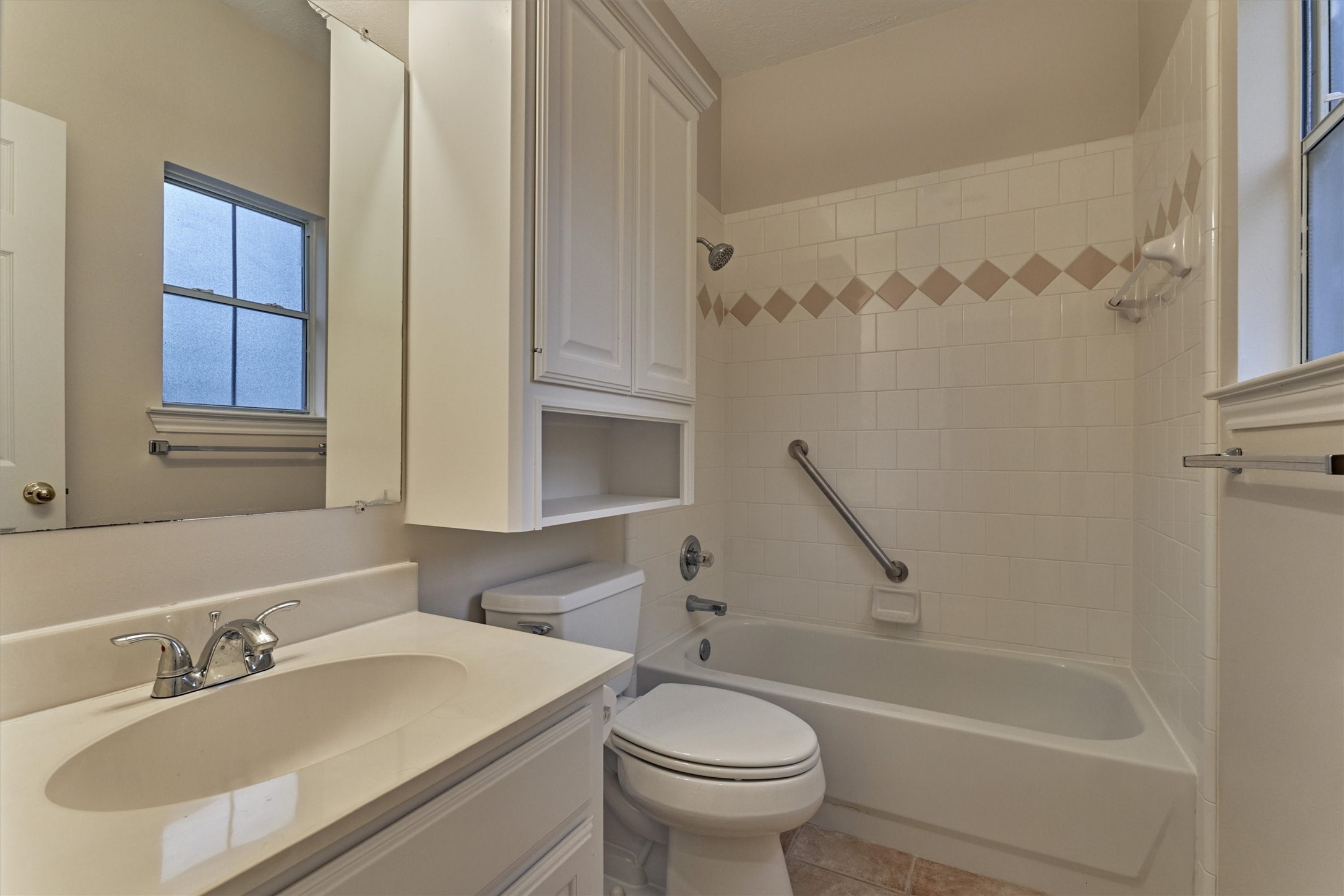 16707 Avenfield Road Tomball, TX 77377 - Photo 45 of 50 a bathroom with a sink toilet and shower