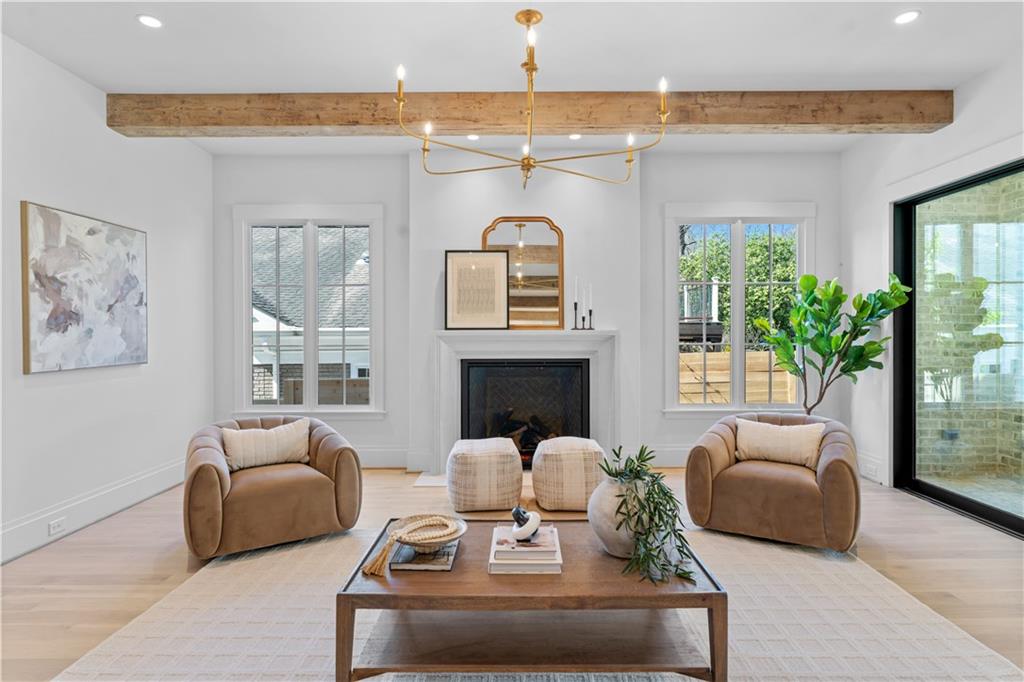 1140 Rosedale Drive Northeast Atlanta, GA 30306 - Photo 11 of 41 a living room with furniture and a fireplace