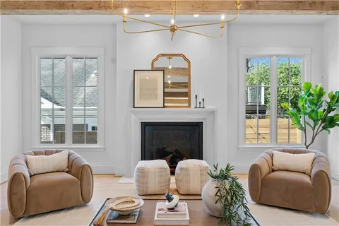 a kitchen with sink and white cabinets