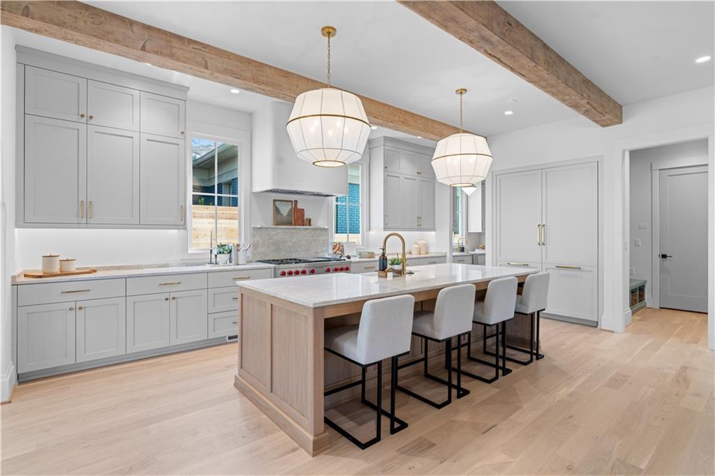 1140 Rosedale Drive Northeast Atlanta, GA 30306 - Photo 13 of 41 a kitchen with sink and white cabinets