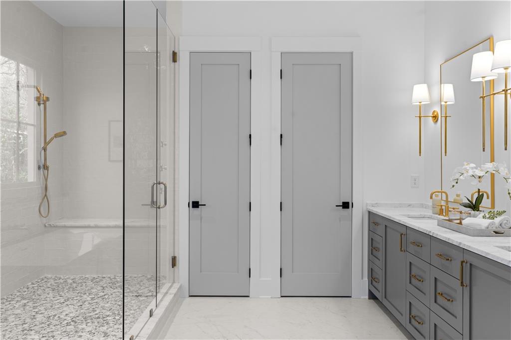 1140 Rosedale Drive Northeast Atlanta, GA 30306 - Photo 27 of 41 a bathroom with a double vanity sink and a mirror