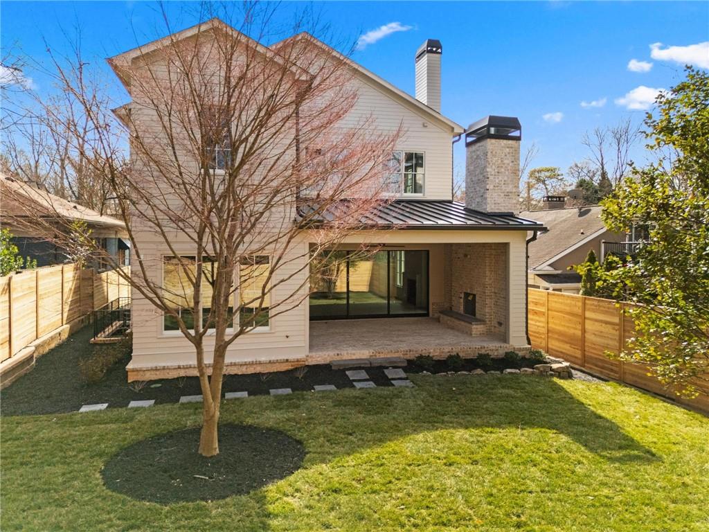 1140 Rosedale Drive Northeast Atlanta, GA 30306 - Photo 39 of 41 a front view of a house with garden