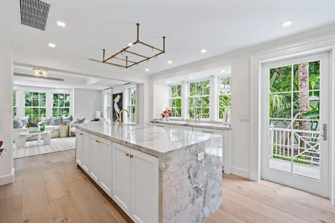 a spacious bedroom with a bed and a couch