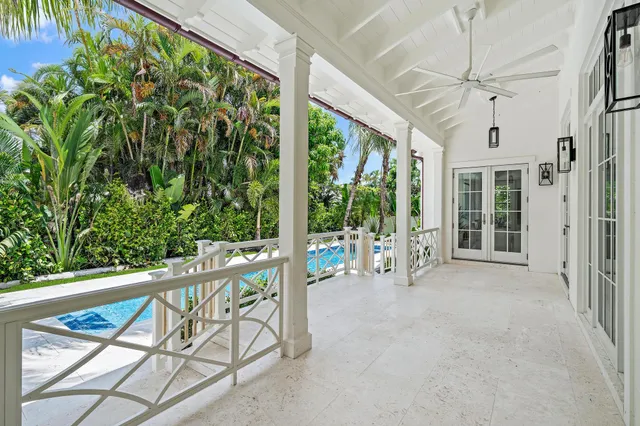 a living room with furniture chandelier and a chandelier