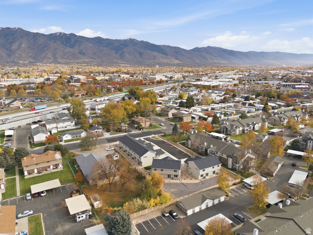 1615 North Angel Street, Unit E Layton, UT 84041 - Photo 37 of 42 View of property location with a mountainous background and nearby suburban area
