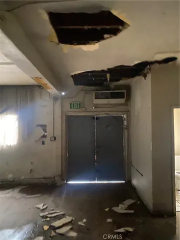 a view of an empty room and window