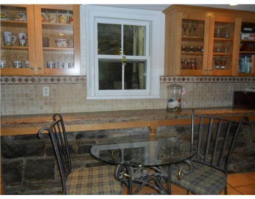 86 Ritch Avenue Greenwich, CT 06830 - Photo 6 of 13 a bathroom with a sink and a mirror