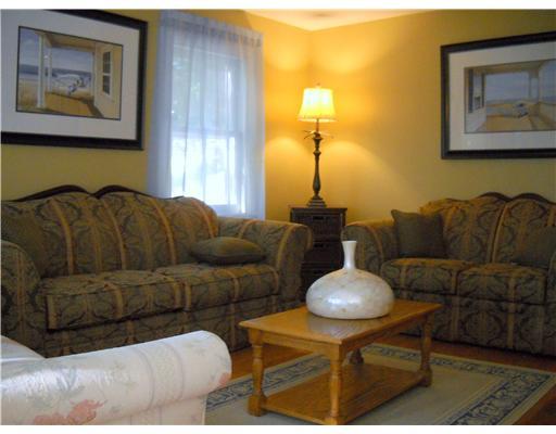 86 Ritch Avenue Greenwich, CT 06830 - Photo 7 of 13 a living room with furniture and a lamp