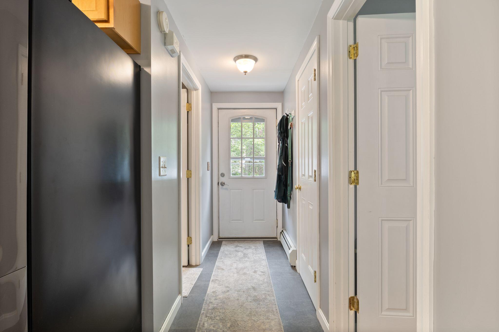 11 Bruschi Road Windham, ME 04062 - Photo 17 of 55 Hallway to side entrance