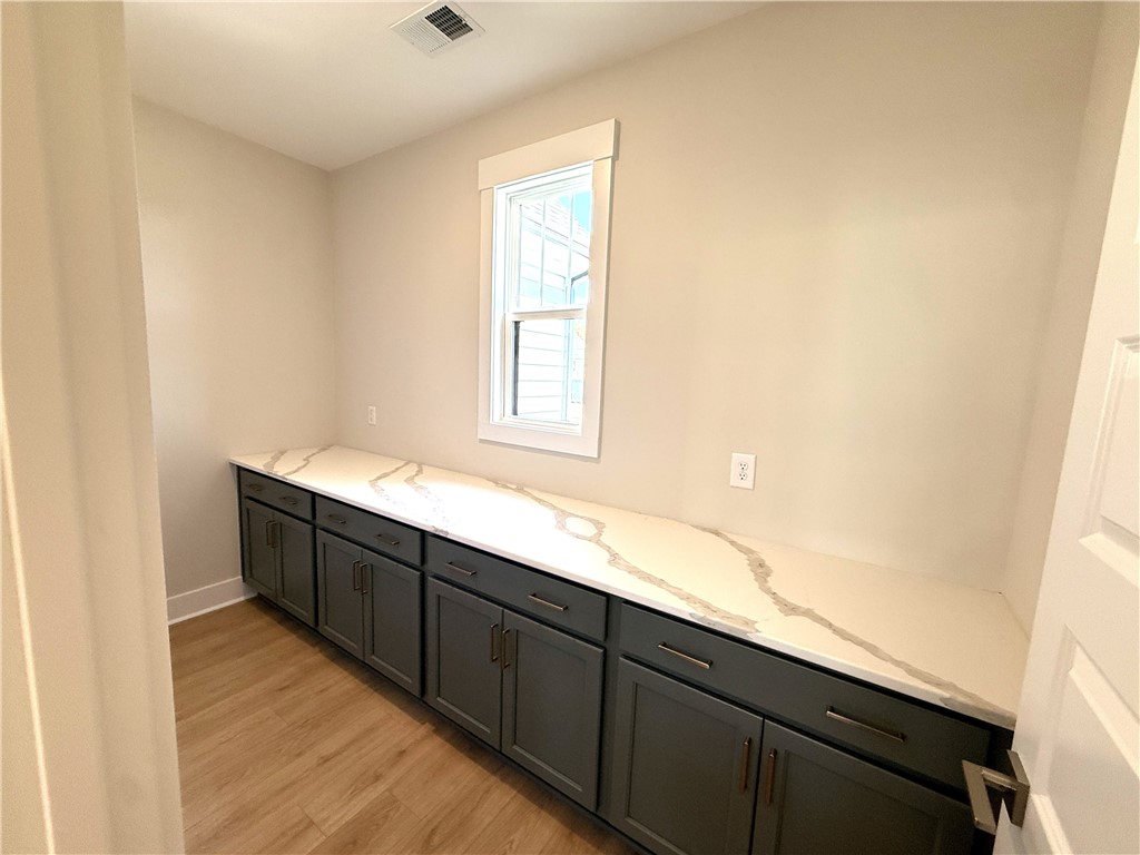 504 Tilman Court Anderson, SC 29621 - Photo 12 of 28 This bright space features sleek cabinetry and elegant countertops.