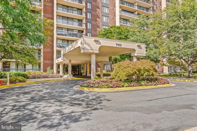 front view of a building with a yard