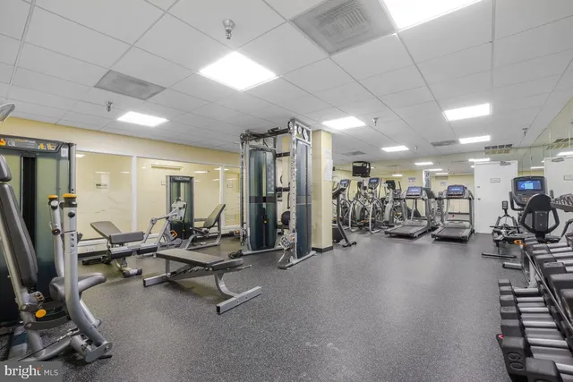 a view of a patio with furniture and garden