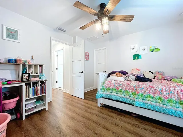 a bathroom with a toilet a sink and shower