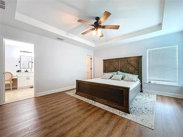 a spacious bathroom with a double vanity sink mirror and