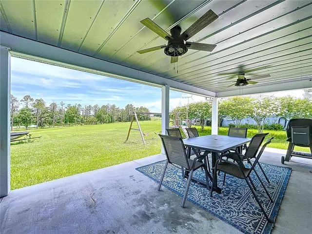 a view of a lake with houses in the background