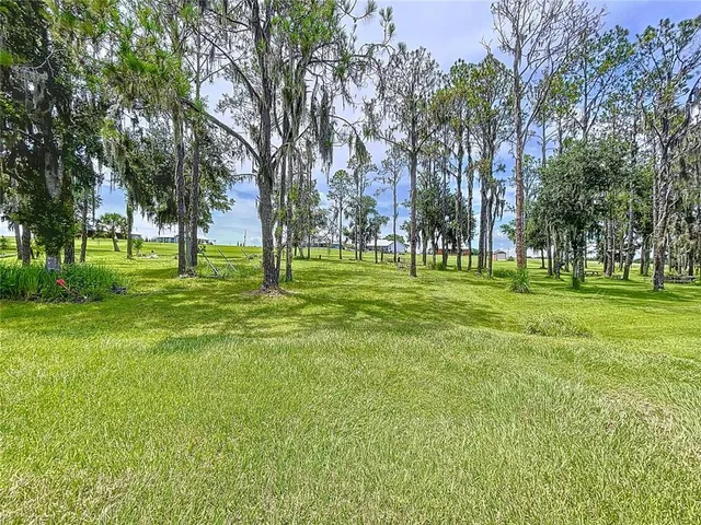 a view of a house with a big yard