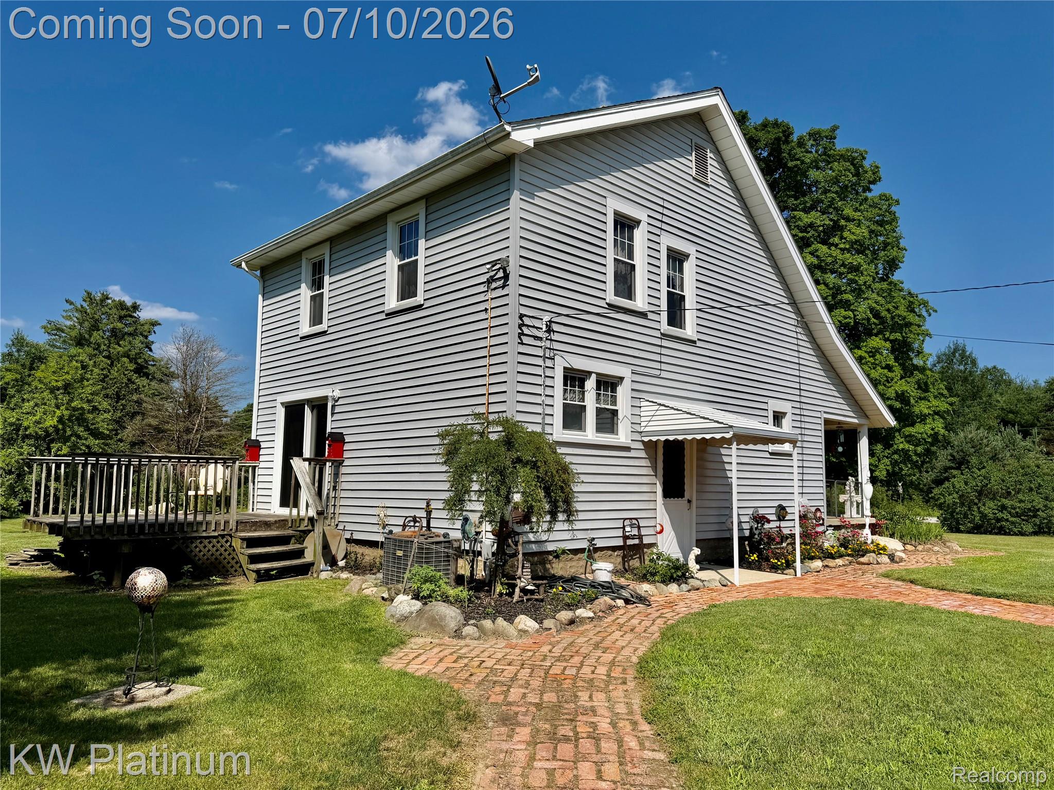 1581 Emerson Road Goodells, MI 48027 - Photo 23 of 45 Two-story property featuring light gray siding and white trim