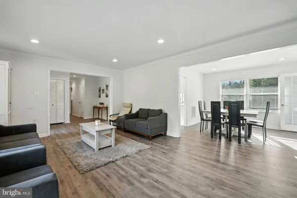a kitchen with a sink stove and refrigerator