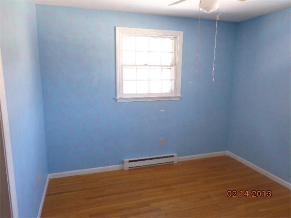 24 Juniper Lane Rutland, MA 01543 - Photo 6 of 11 an empty room with a window