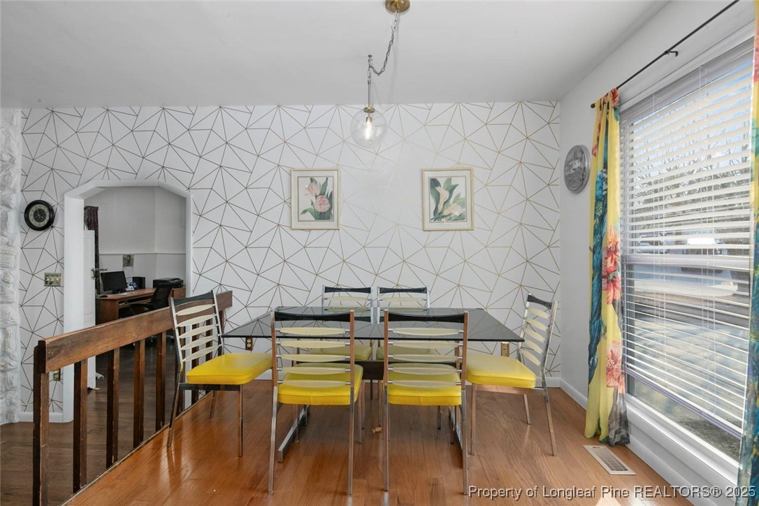 5978 Brookcliff Road Fayetteville, NC 28304 - Photo 14 of 38 a view of a swimming pool with seating space