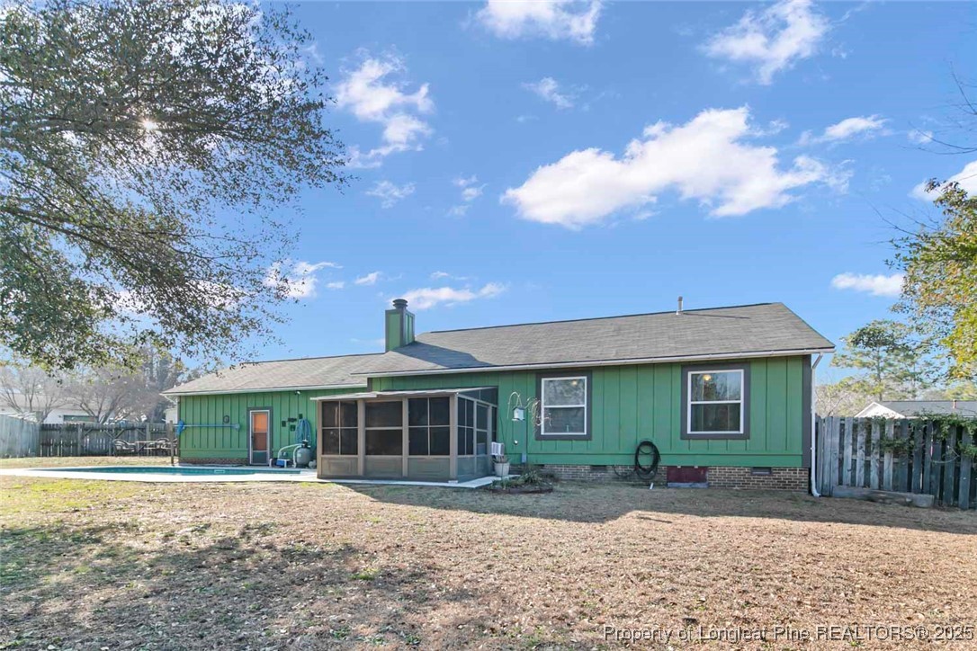 5978 Brookcliff Road Fayetteville, NC 28304 - Photo 6 of 38 a front view of a house with a yard