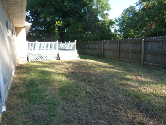 303 Willow Street Manchester, TN 37355 - Photo 15 of 15 a view of a yard with large trees