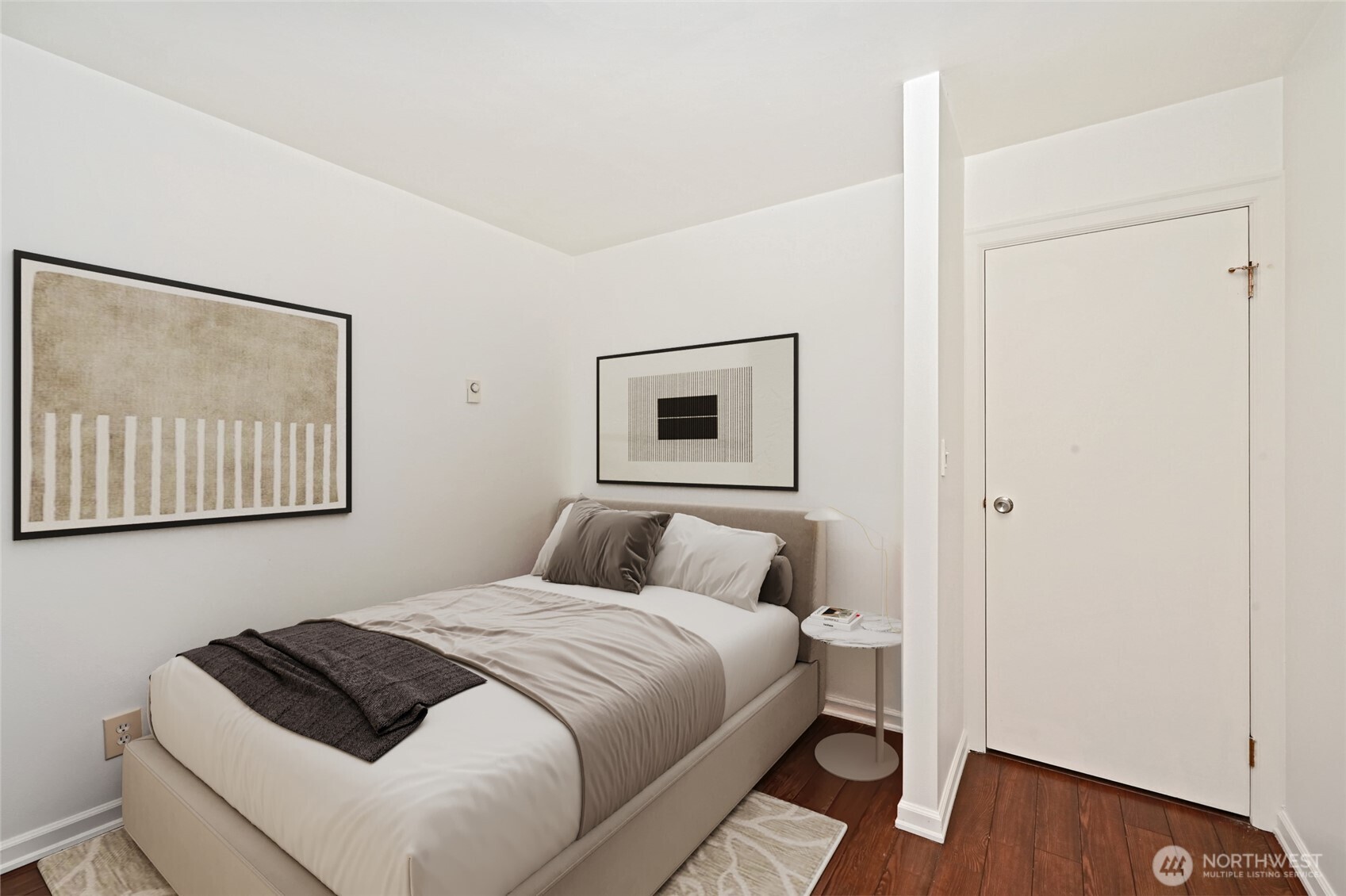2100 3rd Avenue, Unit 1503 Seattle, WA 98121 - Photo 17 of 40 a bedroom with a bed and a window