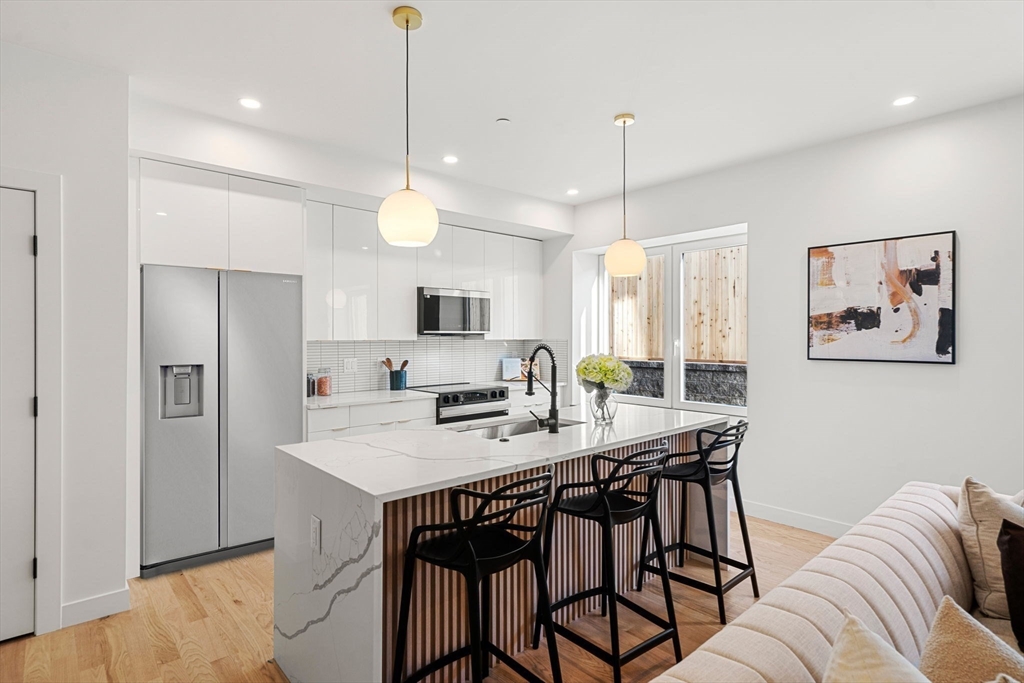 122 Washington Street, Unit 22 Weymouth, MA 02188 - Photo 2 of 37 a view of a dining room with furniture