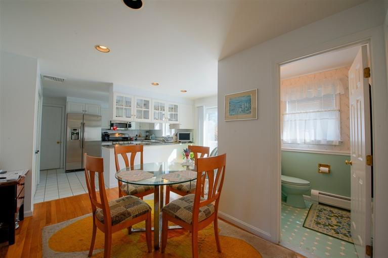 126 River Ridge Road Marstons Mills, MA 02648 - Photo 12 of 33 a view of a dining room with furniture and a window