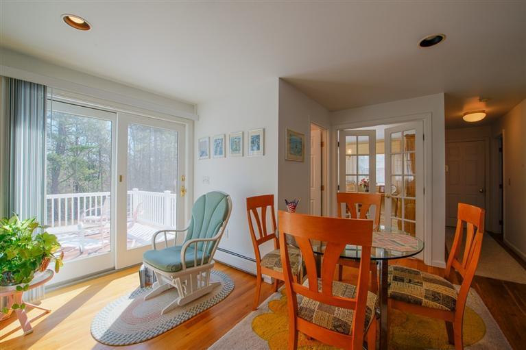 126 River Ridge Road Marstons Mills, MA 02648 - Photo 13 of 33 a dining room with furniture and wooden floor