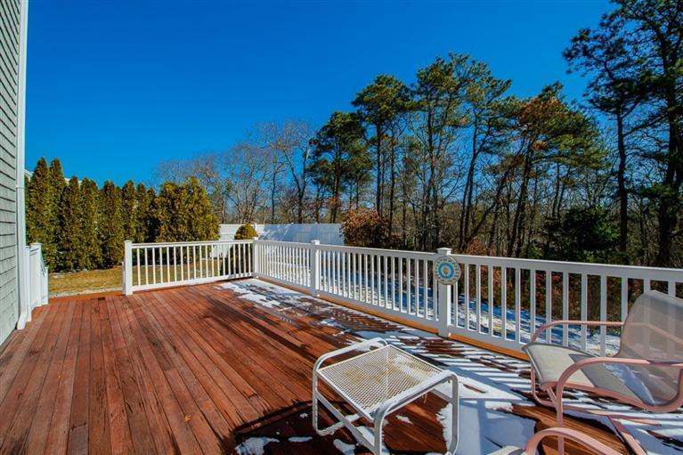 126 River Ridge Road Marstons Mills, MA 02648 - Photo 32 of 33 a view of a patio with a table