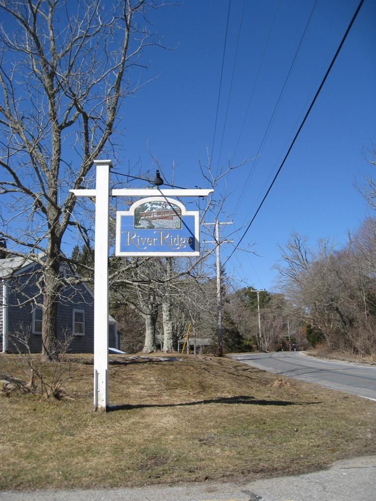 126 River Ridge Road Marstons Mills, MA 02648 - Photo 33 of 33 a sign broad on the side of a road