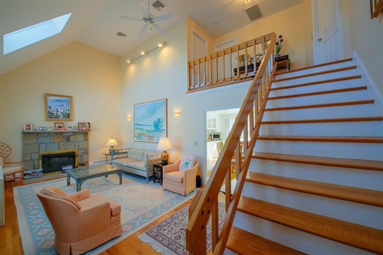 126 River Ridge Road Marstons Mills, MA 02648 - Photo 4 of 33 a living room with furniture and a fireplace