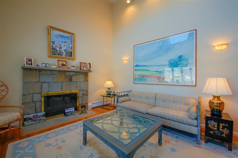 126 River Ridge Road Marstons Mills, MA 02648 - Photo 8 of 33 a living room with furniture and a fireplace