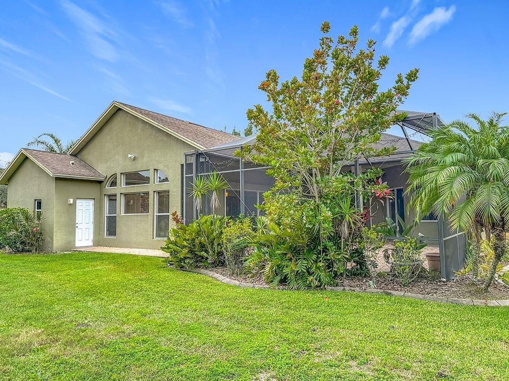 20626 Longleaf Pine Avenue Tampa, FL 33647 - Photo 40 of 86 a front view of a house with a yard