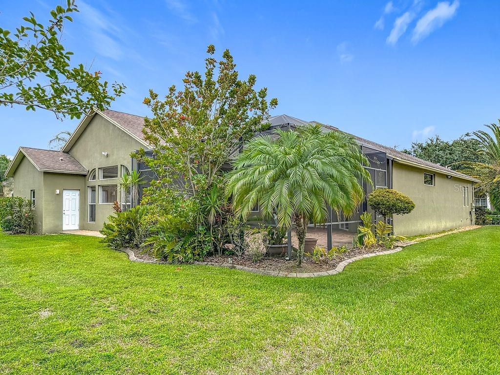 20626 Longleaf Pine Avenue Tampa, FL 33647 - Photo 41 of 86 a garden view with a seating space