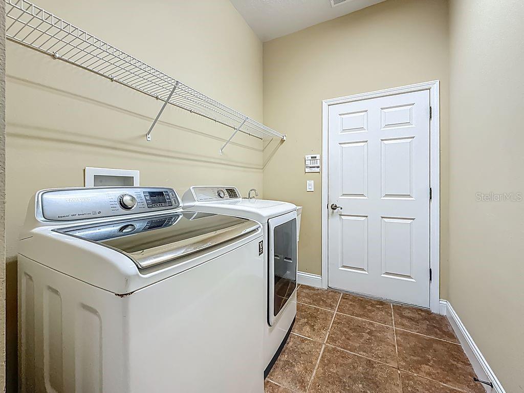 20626 Longleaf Pine Avenue Tampa, FL 33647 - Photo 45 of 86 a utility room with dryer and washer