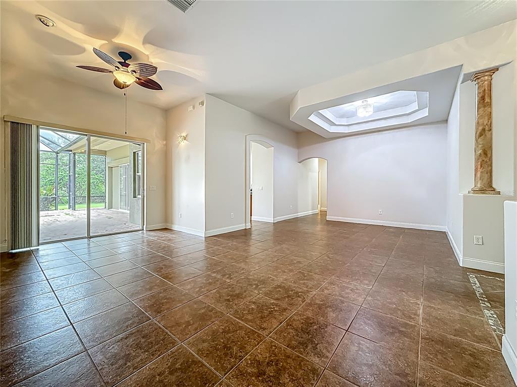 20626 Longleaf Pine Avenue Tampa, FL 33647 - Photo 5 of 86 a view of an empty room with a window