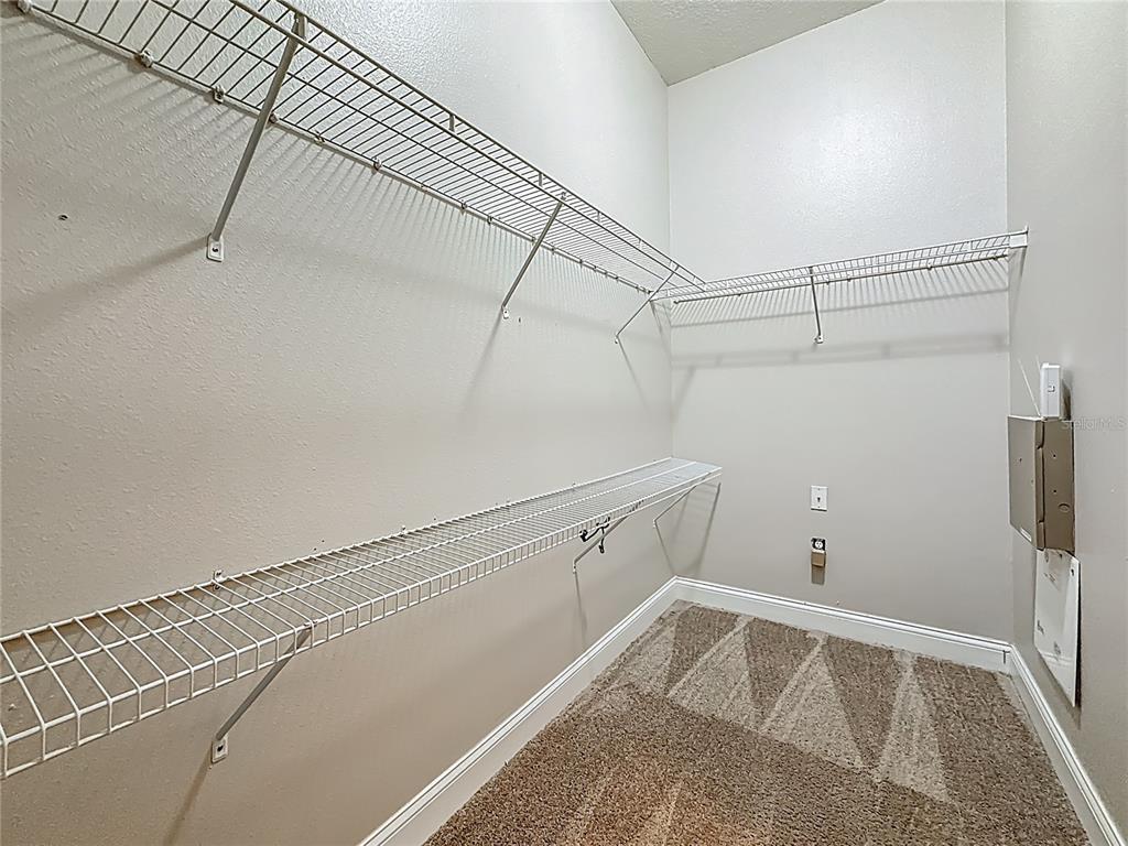 20626 Longleaf Pine Avenue Tampa, FL 33647 - Photo 57 of 86 a view of a room with racks on the wall