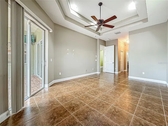 a kitchen with stainless steel appliances granite countertop a stove a refrigerator and a sink