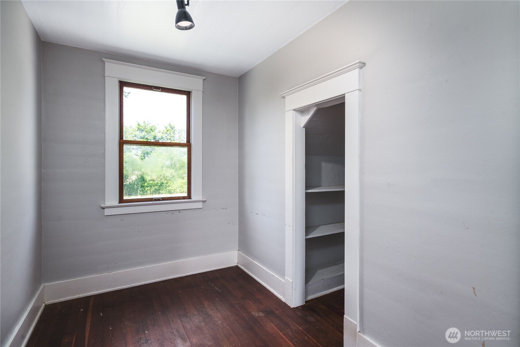 19719 Dry Slough Road Mount Vernon, WA 98273 - Photo 26 of 40 an empty room with a window and wooden floor
