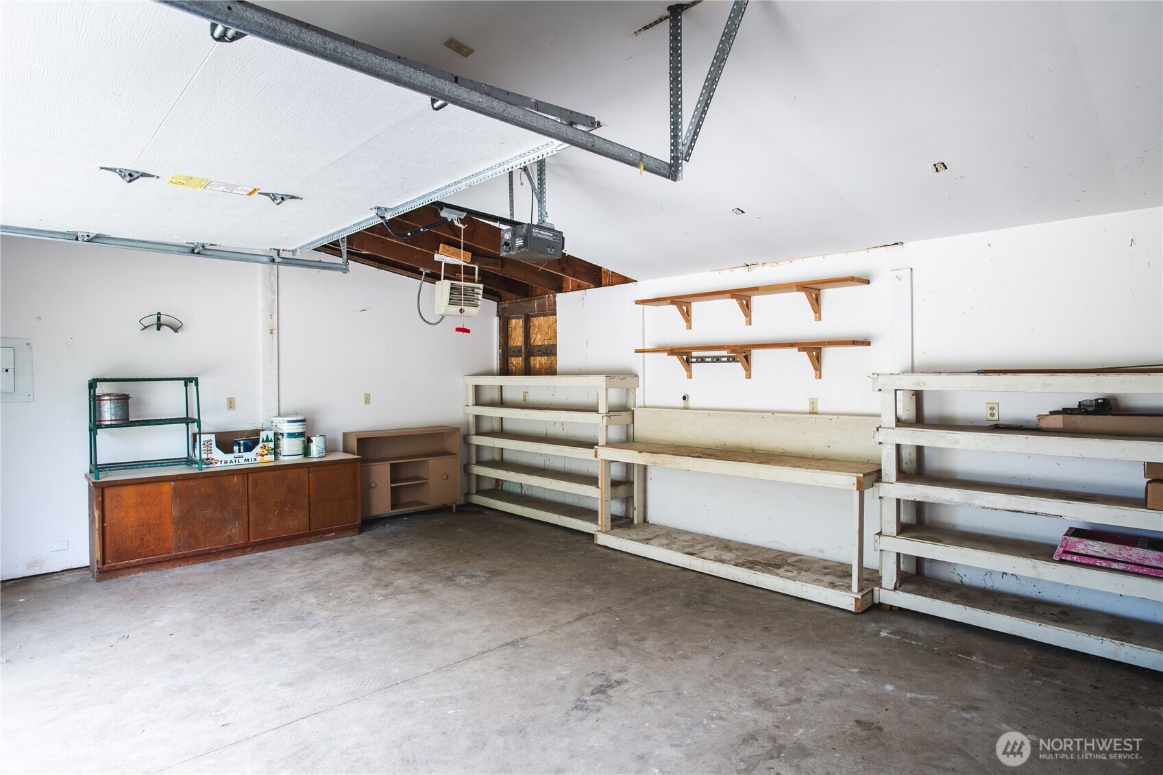 19719 Dry Slough Road Mount Vernon, WA 98273 - Photo 33 of 40 a storage room with stairs and a chandelier